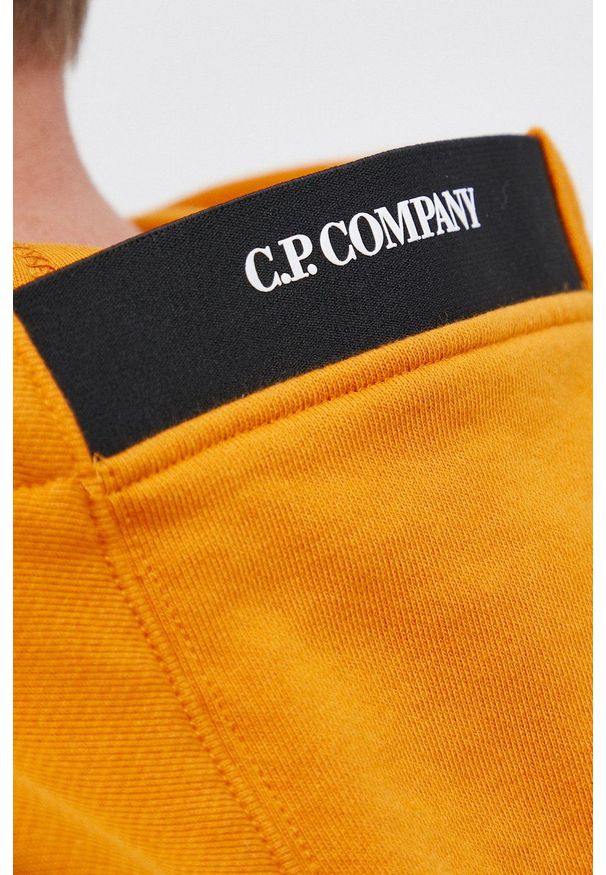C.P. Company - Bluza bawełniana. Okazja: na co dzień. Kolor: pomarańczowy. Materiał: bawełna. Styl: casual
