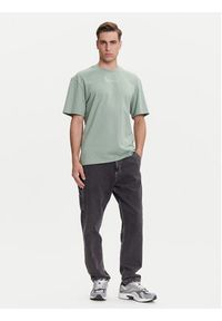 Karl Kani T-Shirt Small Signature Essential PD00008142 Zielony Relaxed Fit. Kolor: zielony. Materiał: bawełna