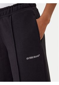 Guess Jeans Spodnie dresowe W5BB04 KC811 Czarny Wide Leg. Kolor: czarny. Materiał: bawełna