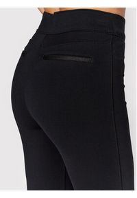 Spanx - SPANX Spodnie materiałowe The Perfect 20252R Czarny Flare Fit. Kolor: czarny. Materiał: wiskoza #3