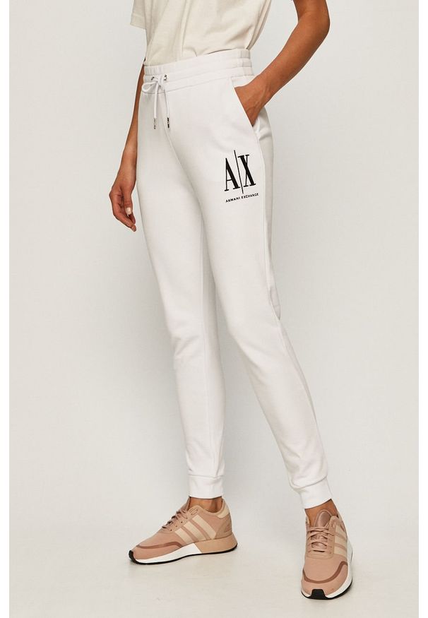 Armani Exchange - Spodnie. Kolor: biały. Materiał: bawełna, dzianina. Wzór: nadruk