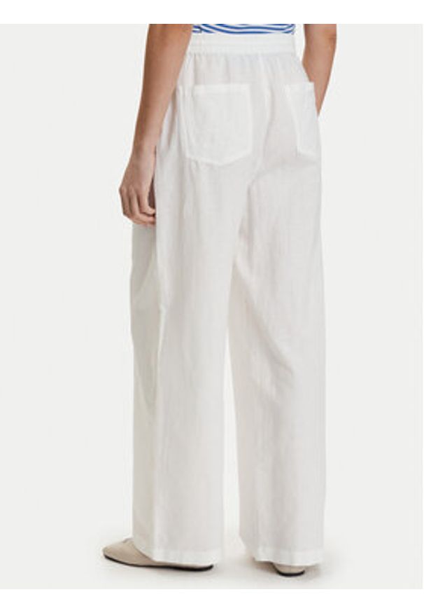 Tommy Jeans Spodnie materiałowe DW0DW22285 Biały Loose Fit. Kolor: biały. Materiał: len