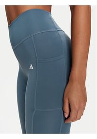 Adidas - adidas Legginsy Optime IT9110 Niebieski Slim Fit. Kolor: niebieski. Materiał: syntetyk