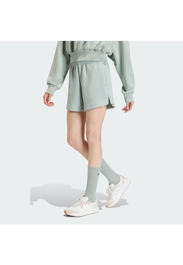 Adidas - Szorty Soft Lux Loose. Kolor: zielony. Sport: fitness