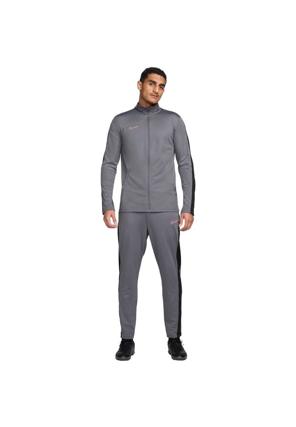Dres Nike Nike Academy, Mężczyźni. Kolor: szary. Materiał: dresówka. Sport: fitness
