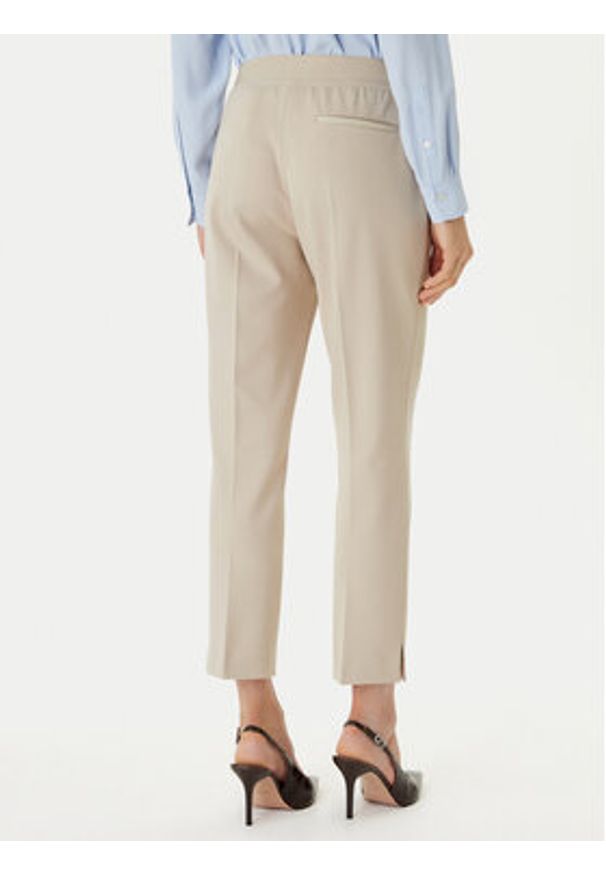 BOSS Spodnie materiałowe Tapria 50556341 Beżowy Slim Fit. Kolor: beżowy. Materiał: syntetyk