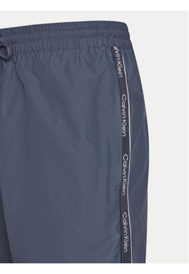 Calvin Klein Swimwear Szorty kąpielowe KM0KM01109 Niebieski Regular Fit. Kolor: niebieski. Materiał: syntetyk