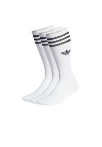 Adidas - Skarpetki adidas Solid Crew IJ0734 - białe. Kolor: biały. Materiał: bawełna, poliester, elastan, materiał, nylon. Wzór: aplikacja, paski #1