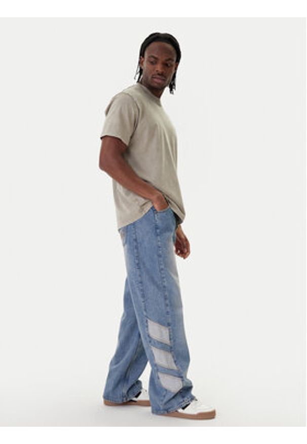 Adidas - adidas Jeansy KE0112 Niebieski Loose Fit. Kolor: niebieski