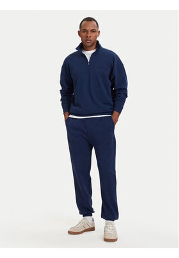 TOMMY HILFIGER - Tommy Hilfiger Bluza Essential UM0UM03909 Granatowy Regular Fit. Kolor: niebieski. Materiał: bawełna
