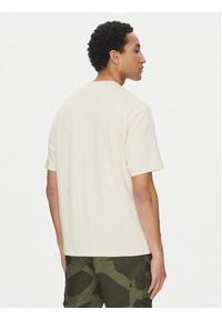Nike T-Shirt FN5982 Beżowy Regular Fit. Kolor: beżowy. Materiał: bawełna
