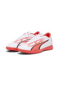 Buty piłkarskie dla dzieci Puma Ultra Play It Jr. Kolor: biały, czarny, czerwony, wielokolorowy. Materiał: syntetyk, materiał. Szerokość cholewki: normalna. Sport: piłka nożna