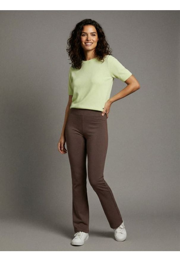 Sinsay - Legginsy flare - brązowy. Kolor: brązowy