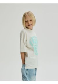 Reserved - T-shirt z nadrukiem - złamana biel. Materiał: bawełna, dzianina. Wzór: nadruk