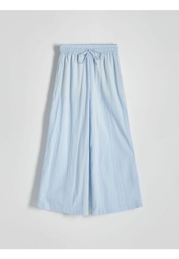 Reserved - Spodnie culotte - jasnoniebieski. Kolor: niebieski. Materiał: bawełna, tkanina