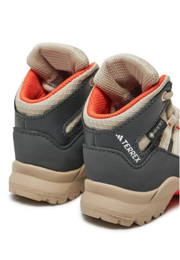 Adidas - adidas Trekkingi Terrex Mid GORE-TEX ID0934 Beżowy. Kolor: beżowy. Materiał: materiał. Technologia: Gore-Tex. Model: Adidas Terrex. Sport: turystyka piesza