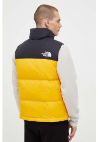 The North Face bezrękawnik puchowy męski kolor żółty zimowy. Typ kołnierza: kaptur. Kolor: żółty. Materiał: puch. Długość rękawa: bez rękawów. Sezon: zima #2