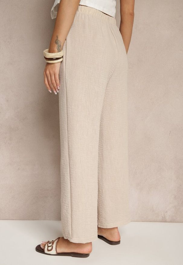 Renee - Beżowe Spodnie High Waist z Szeroką Nogawką i Gumką w Pasie Mirarena. Okazja: do pracy, na co dzień, na spotkanie biznesowe. Stan: podwyższony. Kolor: beżowy. Styl: casual, elegancki, biznesowy