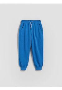 Reserved - Spodnie jogger - niebieski. Kolor: niebieski. Materiał: dzianina, bawełna #1