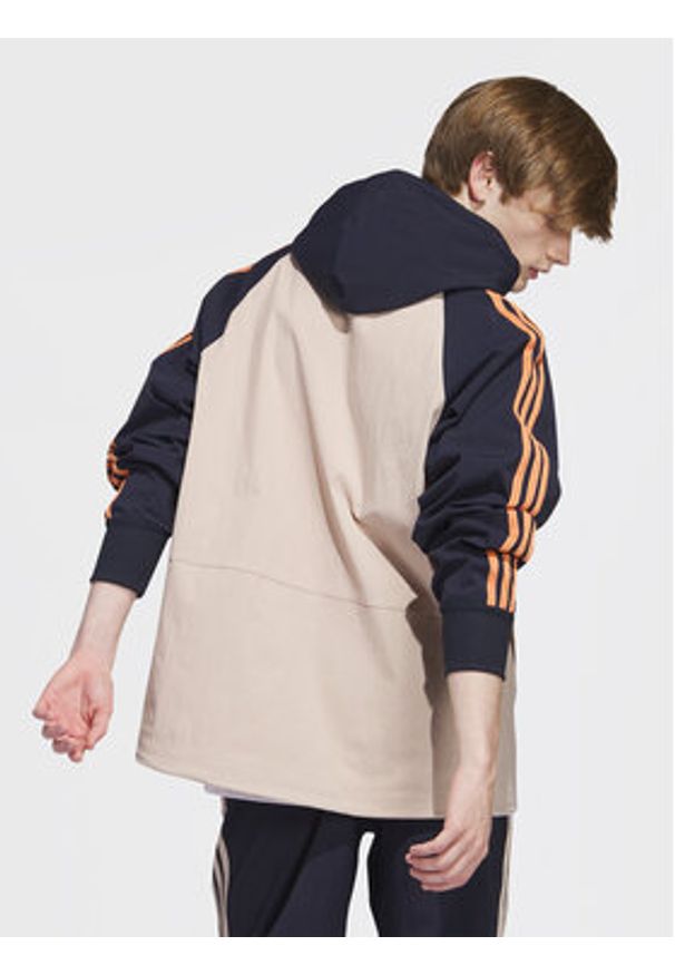 Adidas - adidas Bluza SST Hooded Windbreaker IC5537 Brązowy Regular Fit. Kolor: brązowy. Materiał: syntetyk