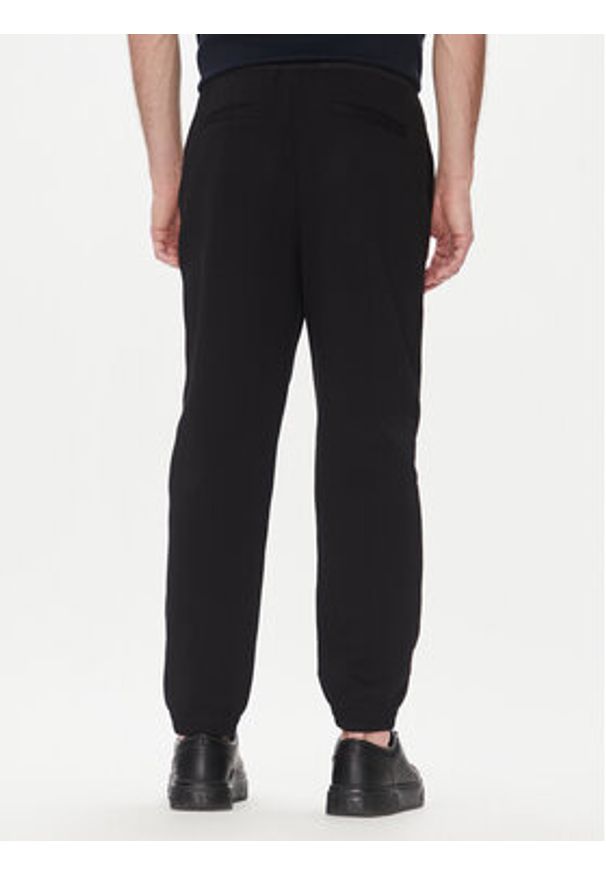 Armani Exchange Spodnie dresowe XM000516 AF13047 MC105 Czarny Regular Fit. Kolor: czarny. Materiał: bawełna