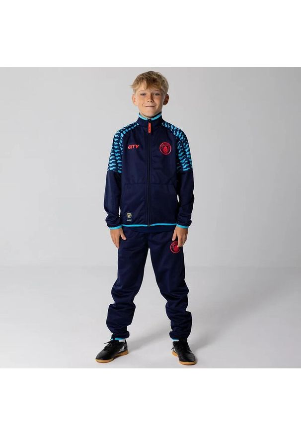 MANCHESTER CITY - Dres piłkarski dziecięcy Manchester City 24/25. Kolor: niebieski. Materiał: dresówka. Styl: młodzieżowy, sportowy