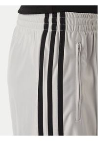 Adidas - adidas Spodnie dresowe Metallic Firebird KS9973 Szary jasny Wide Leg. Kolor: szary. Materiał: syntetyk #2
