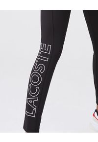 Lacoste - LACOSTE - Czarne legginsy z kontrastowym logo. Stan: podwyższony. Kolor: czarny. Styl: sportowy #2