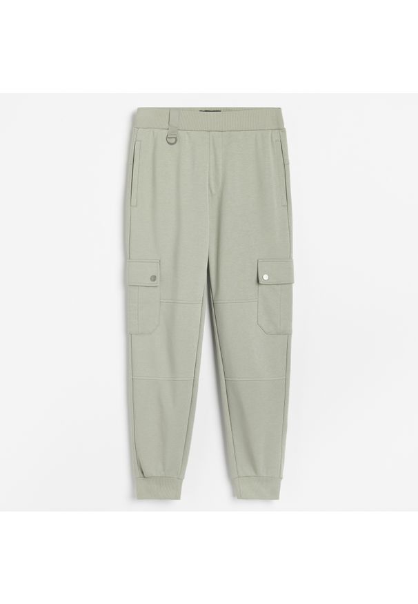 Reserved - Dzianinowe spodnie typu cargo - Khaki. Kolor: brązowy. Materiał: dzianina