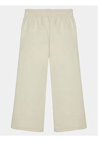 GAP - Gap Spodnie dresowe 739992-00 Beżowy Relaxed Fit. Kolor: beżowy. Materiał: bawełna