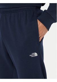 The North Face Spodnie dresowe Evolution Simple Dome NF0A8CWY Granatowy Regular Fit. Kolor: niebieski. Materiał: bawełna #5