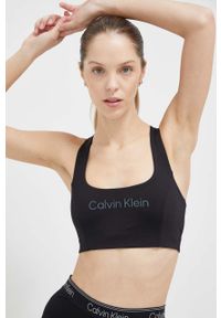 Calvin Klein Performance biustonosz sportowy Essentials kolor czarny. Kolor: czarny. Materiał: skóra. Sport: fitness, taniec