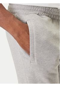 Adidas - adidas Spodnie dresowe Trefoil Essentials JY6271 Szary Slim Fit. Kolor: szary. Materiał: bawełna #5