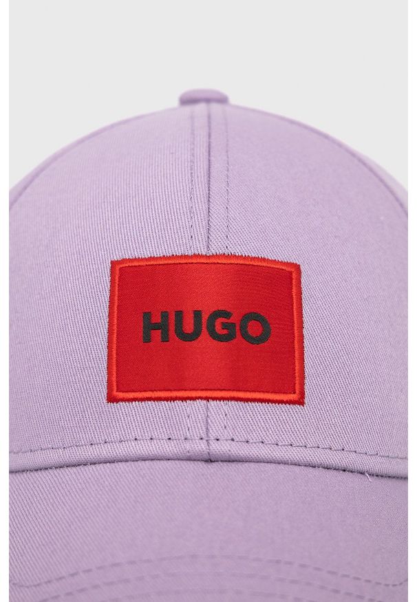 Hugo - HUGO czapka bawełniana kolor fioletowy z aplikacją. Kolor: fioletowy. Materiał: bawełna. Wzór: aplikacja