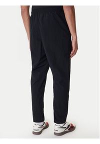 Reebok Spodnie dresowe Barrett RK25552CCM Czarny Regular Fit. Kolor: czarny. Materiał: syntetyk #5