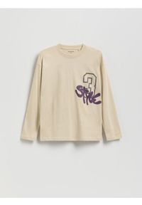 Reserved - Longsleeve z nadrukiem - beżowy. Kolor: beżowy. Materiał: bawełna, dzianina. Długość rękawa: długi rękaw. Wzór: nadruk