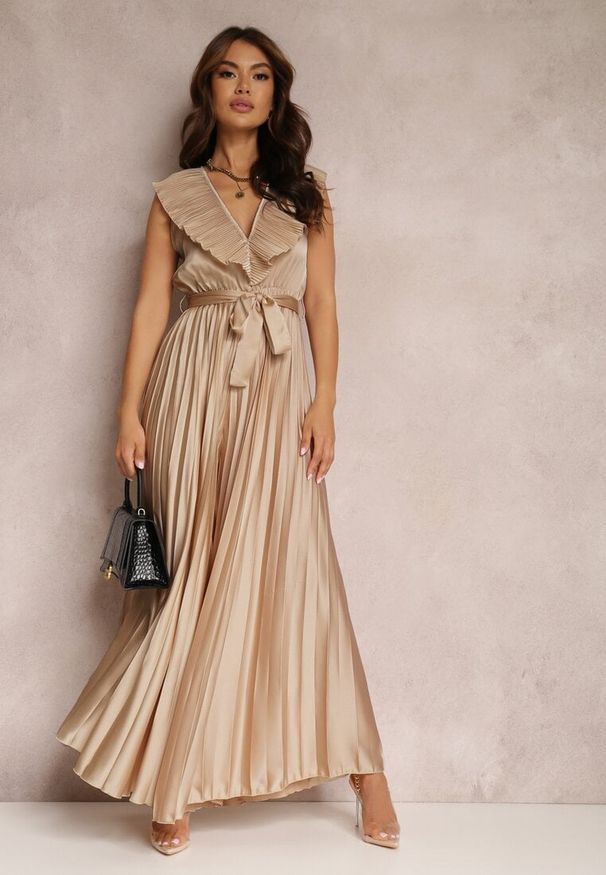 Renee - Beżowy Kombinezon Plisowany Hyrmane. Kolor: beżowy. Materiał: materiał. Długość: długie. Styl: elegancki, wizytowy