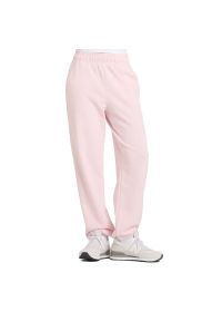 Spodnie New Balance WP41500RSG - różowe. Kolor: różowy. Materiał: dresówka, bawełna, poliester