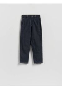 Reserved - Jeansy chino slim fit - granatowy. Kolor: niebieski