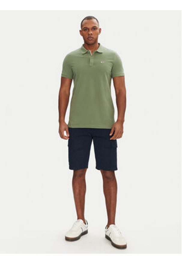 Tommy Jeans Polo DM0DM20676 Zielony Slim Fit. Typ kołnierza: polo. Kolor: zielony. Materiał: bawełna