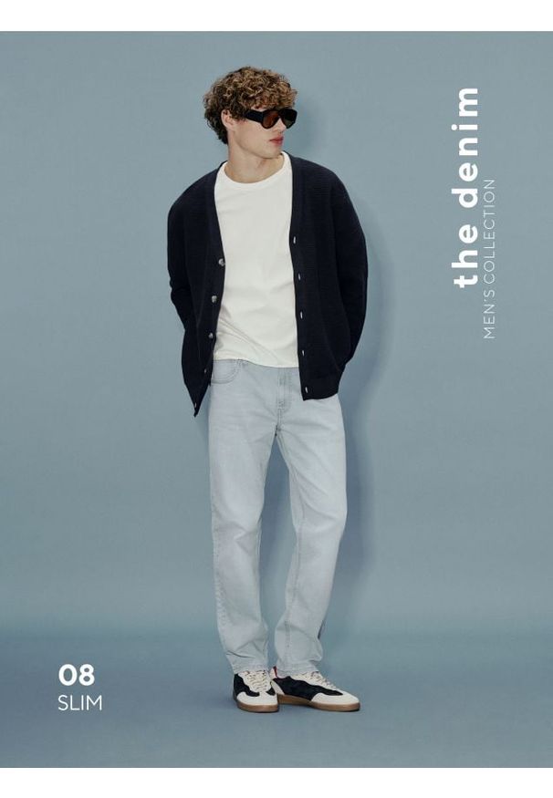 Reserved - Jeansy slim z efektem sprania - niebieski. Kolor: niebieski