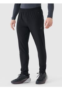 4f - 4F Spodnie treningowe szybkoschnące męskie - czarne 3XL. Kolor: czarny. Materiał: dzianina, dresówka, włókno, syntetyk, materiał, elastan. Wzór: ze splotem, jednolity. Sport: fitness