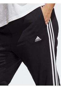 Adidas - adidas Spodnie dresowe Essentials 3-Stripes French Terry Cuffed Joggers (Plus Size) IB8745 Czarny Slim Fit. Kolekcja: plus size. Kolor: czarny. Materiał: bawełna