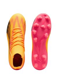 Buty piłkarskie Puma Ultra Pro FG/AG 107769 03 pomarańczowe. Kolor: pomarańczowy. Materiał: syntetyk. Szerokość cholewki: normalna. Sport: piłka nożna