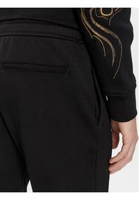 Armani Exchange Spodnie dresowe 3DZPDG ZJ4XZ 1200 Czarny Regular Fit. Kolor: czarny. Materiał: dresówka, bawełna #4