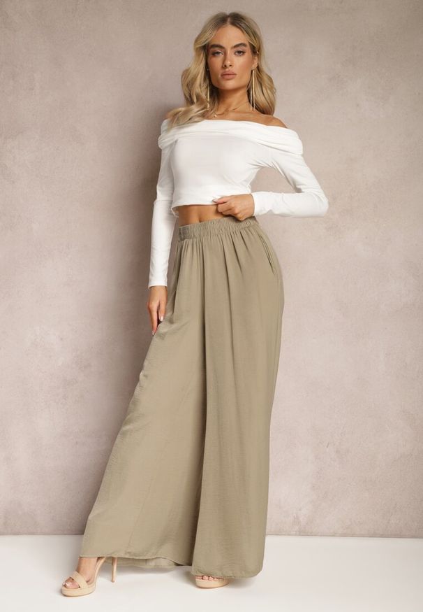 Renee - Zielone Letnie Spodnie o Szerokim Fasonie z Gumką w Talii Philomen. Kolor: zielony. Sezon: lato