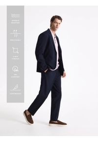 Reserved - Spodnie garniturowe slim fit - granatowy. Kolor: niebieski. Materiał: tkanina, elastan, wiskoza #1