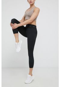 adidas Performance legginsy treningowe damskie kolor czarny gładkie. Kolor: czarny. Materiał: skóra, poliester, materiał. Wzór: gładki