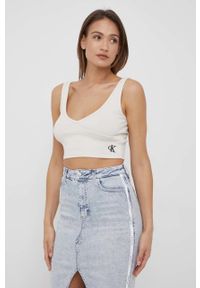 Calvin Klein Jeans top J20J218334.PPYY damski kolor beżowy. Kolor: beżowy. Materiał: lycra, materiał. Długość rękawa: na ramiączkach. Wzór: aplikacja #2