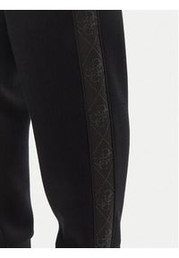 Guess Spodnie dresowe W5YB11 KBYE2 Czarny Regular Fit. Kolor: czarny. Materiał: syntetyk #3
